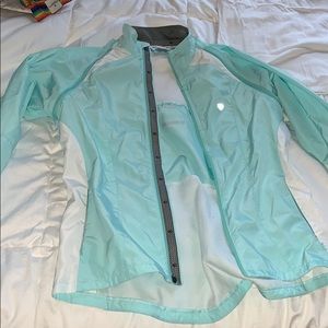 Teal running jacket